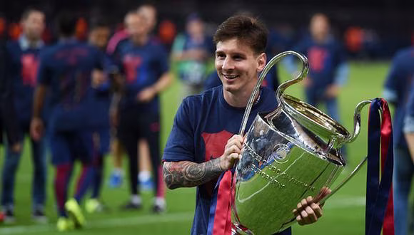 Imagen de Leo con la copa de la champions league